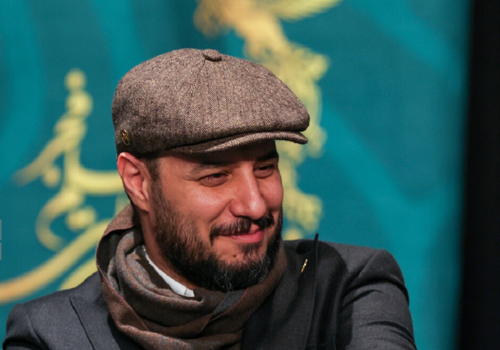 برخورد جالب جواد عزتی با بادیگارد هایش (ویدیو)