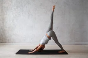 one legged downward facing dog yoga pose